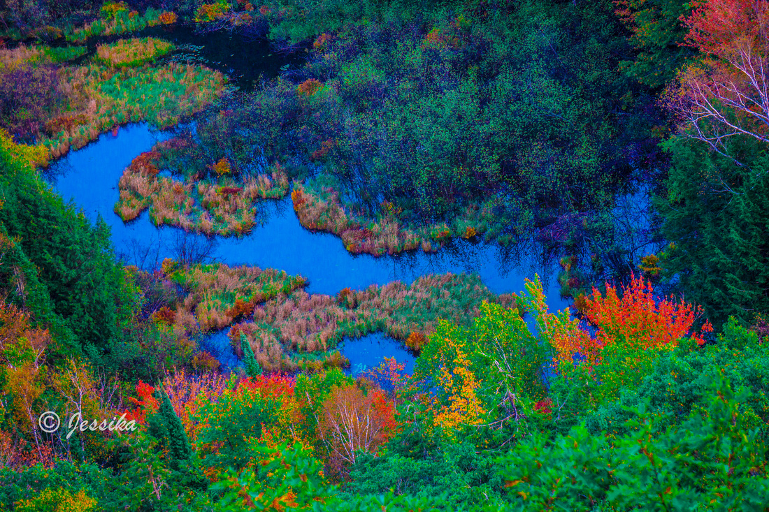 Lake of the Clouds is a lake located in Ontonagon County in the Upper Peninsula of the U.S. state of Michigan within the Porcupine Mountains Wilderness State Park. The lake is situated in a valley between two ridges in the Porcupine Mountains.